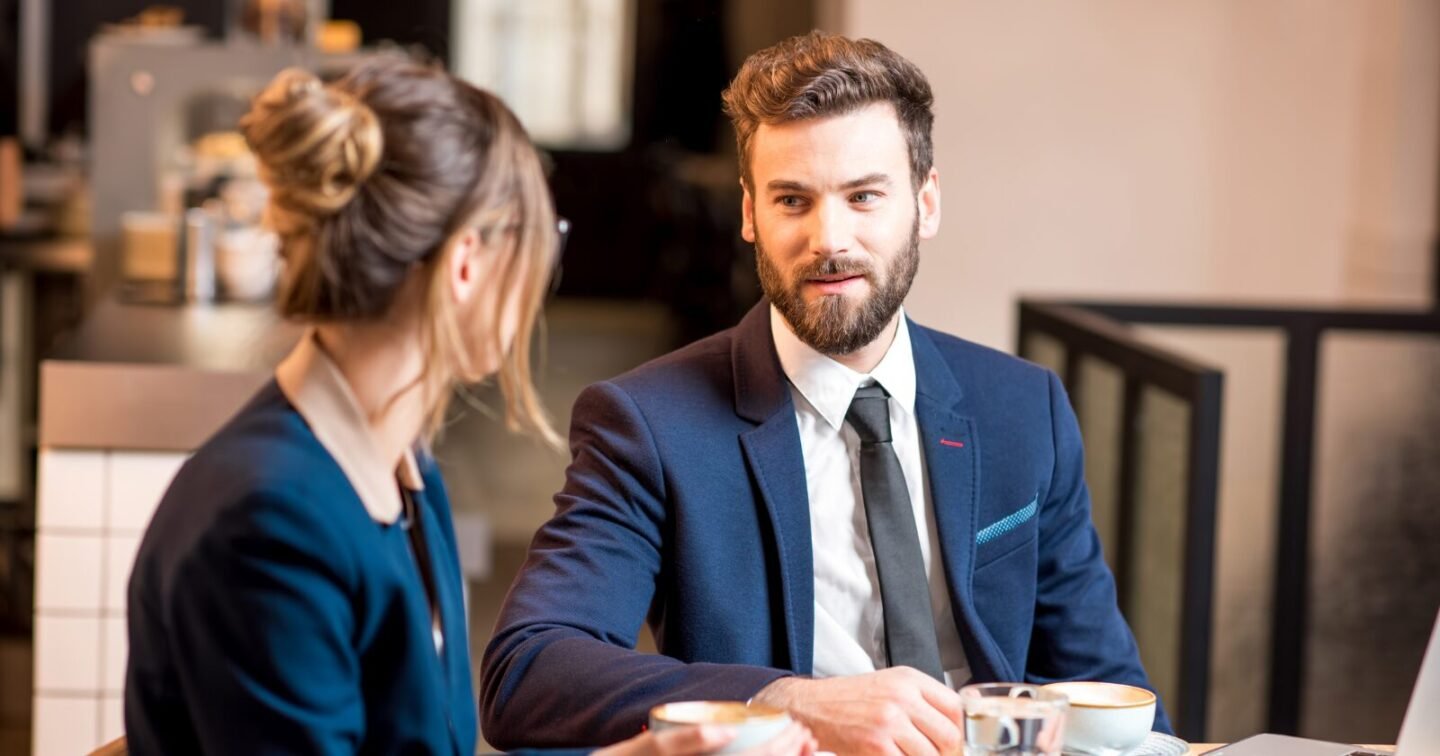 ​If a man displays these 9 subtle behaviors at work, he’s trying to get your attention